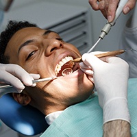 Patient smiling during a dental checkup